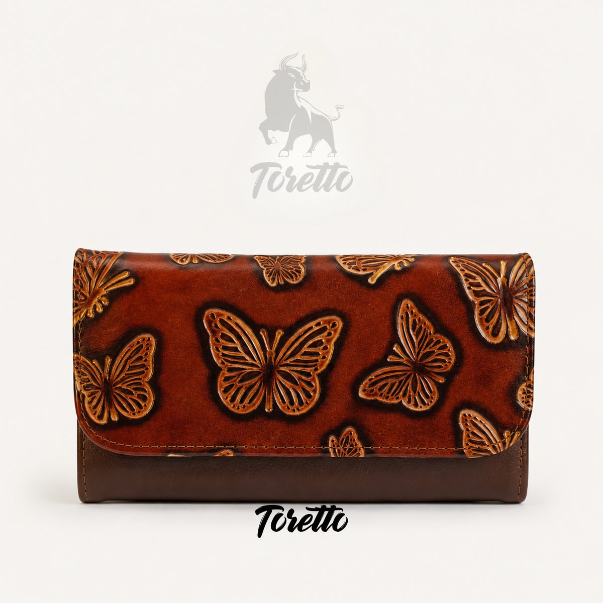 Billetera Aura de Toretto Cueros en cuero conac con diseño Mariposa Visos, vista frontal