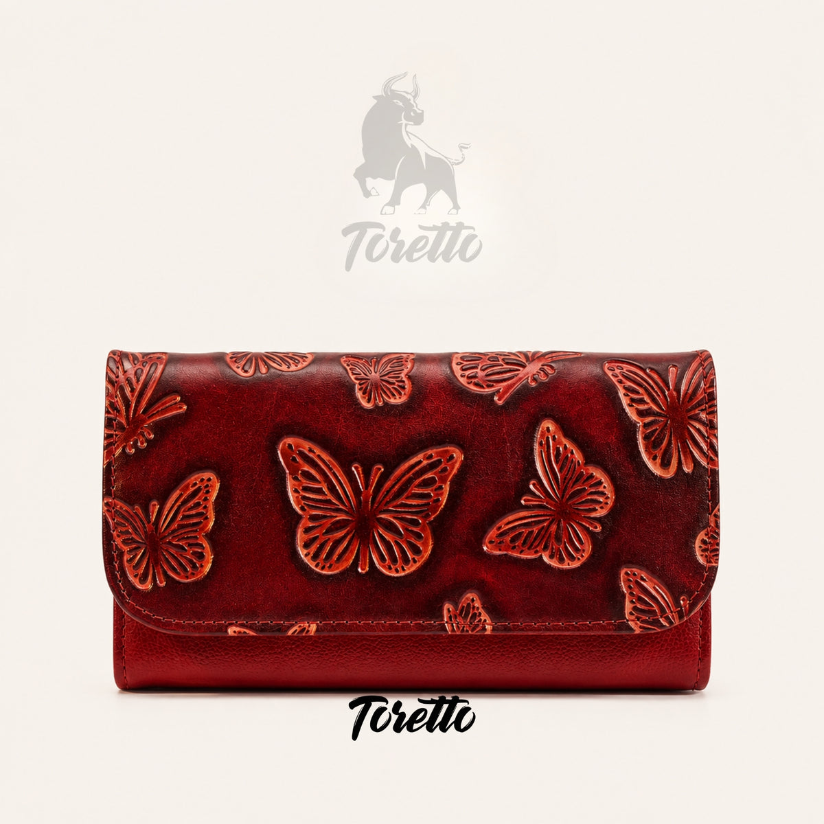 Billetera Aura de Toretto Cueros en cuero rojo con diseño Mariposa Visos, vista frontal
