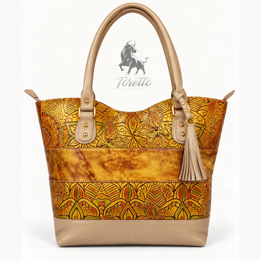 Bolso Altea de Toretto Cueros en cuero dorado con diseño flores, vista frontal