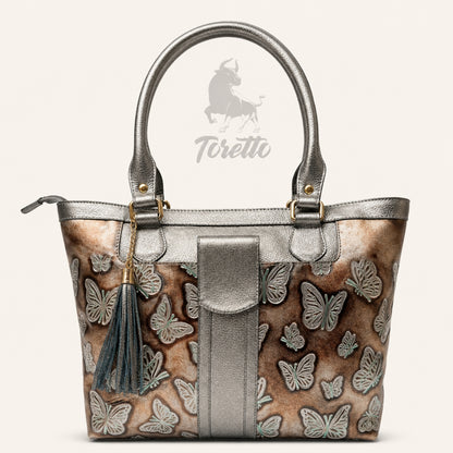 Bolso Aurea de Toretto Cueros en cuero fusil con diseño Mariposa Visos, vista frontal