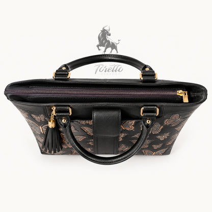 Bolso Aurea de Toretto Cueros en cuero Negro con diseño Mariposa Visos, vista superior cerrado