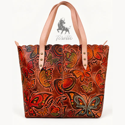 Bolso Cora de Toretto Cueros en cuero nude con diseño Mariposas, vista frontal