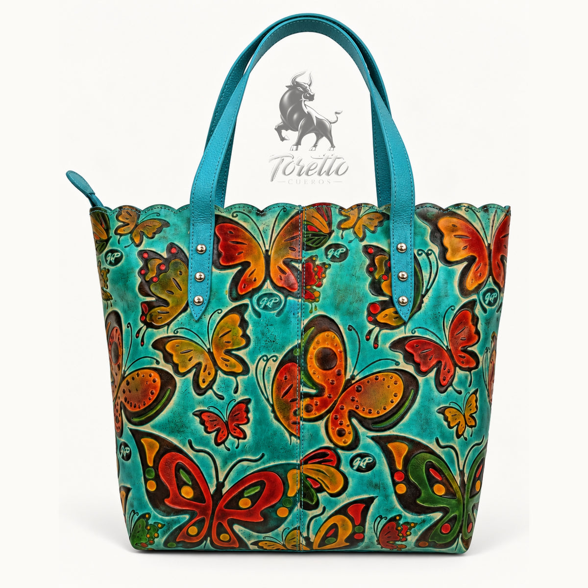 Bolso Cora de Toretto Cueros en cuero turquesa con diseño Mariposas, vista frontal