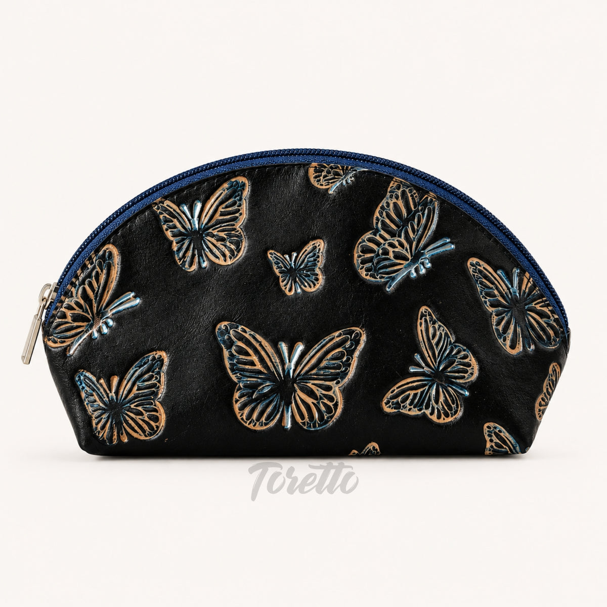 Cosmetiquera Verona de Toretto Cueros en cuero azul con diseño Mariposa Visos, vista frontal