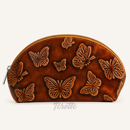 Cosmetiquera Verona de Toretto Cueros en cuero mostaza con diseño Mariposa Visos, vista frontal