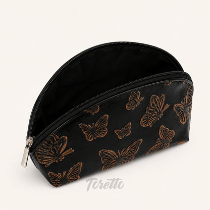 Cosmetiquera Verona de Toretto Cueros en cuero negro con diseño Mariposa Visos, vista superior abierto
