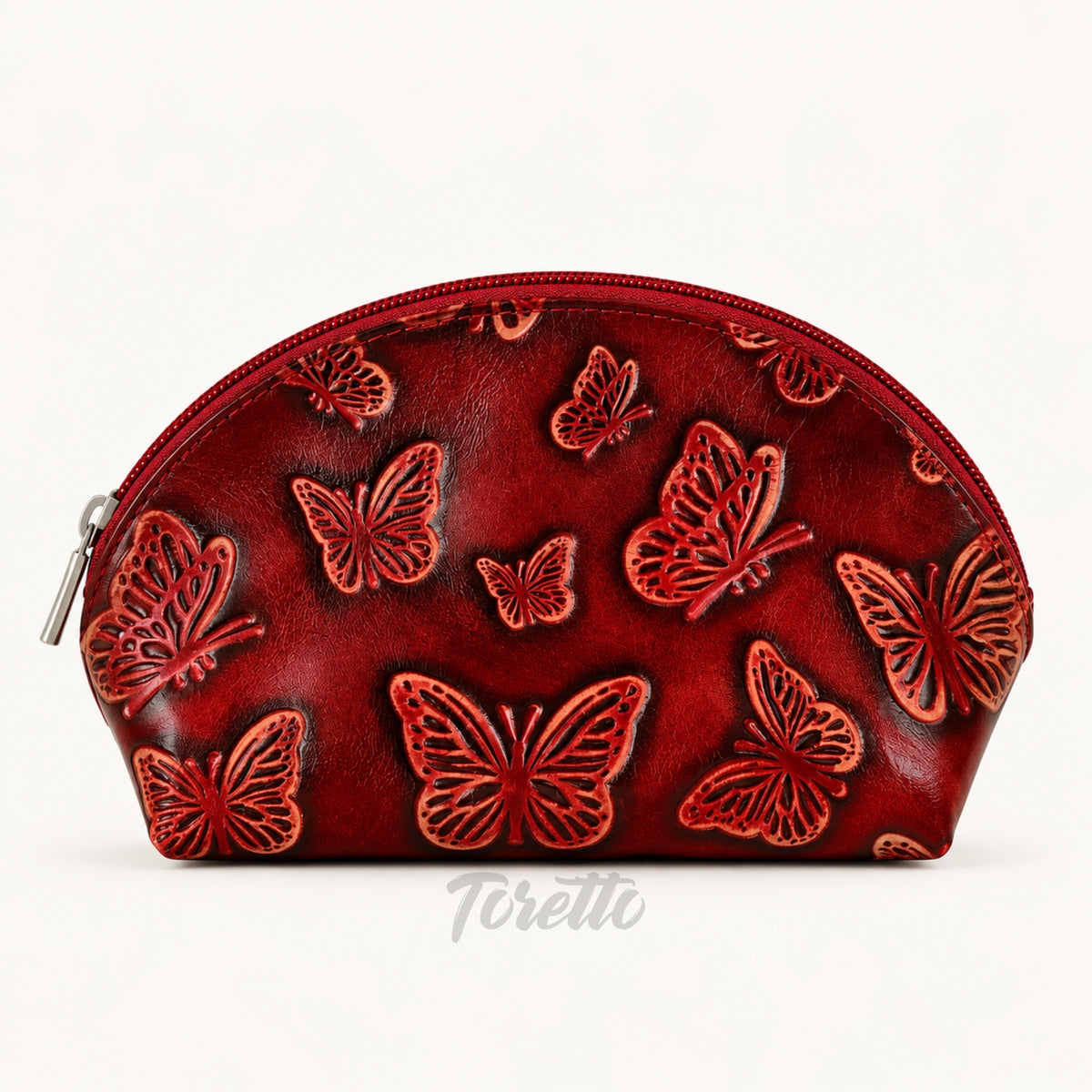 Cosmetiquera Verona de Toretto Cueros en cuero rojo con diseño Mariposa Visos, vista frontal